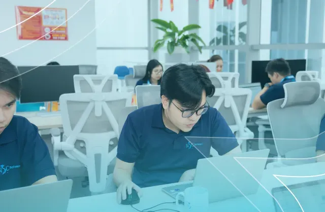 NSC Software team collaborating in a modern office