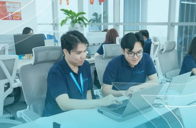 NSC Software team collaborating in a modern office